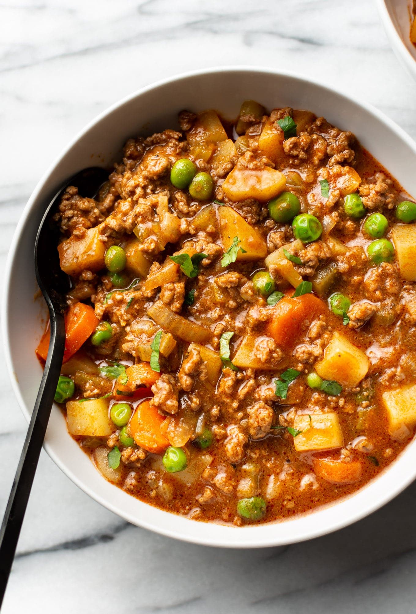 Hamburger Stew with Tender Potatoes and Tomato-Rich Broth