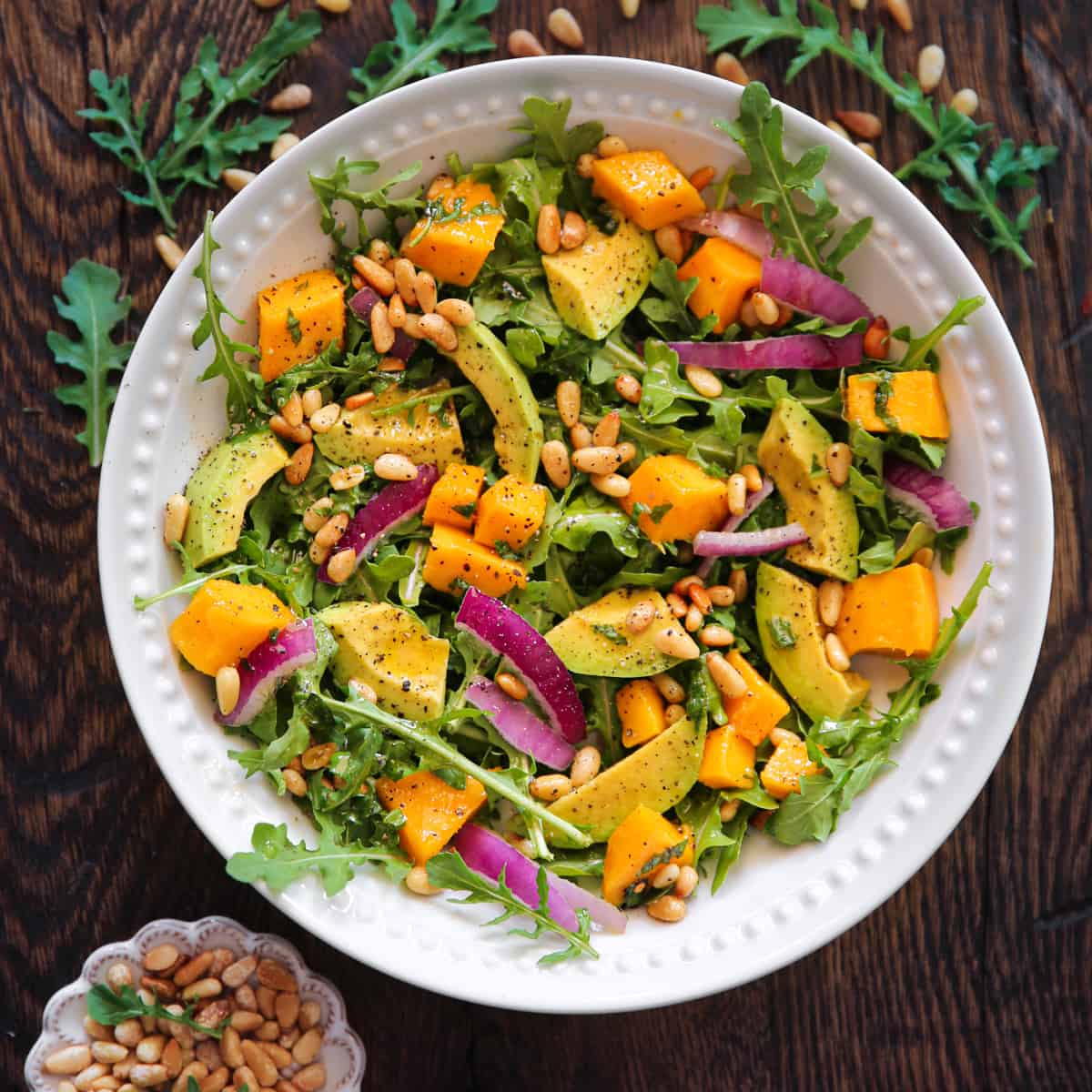 Avocado Mango Salad with Arugula, Pine Nuts, and Honey-Lime Dressing